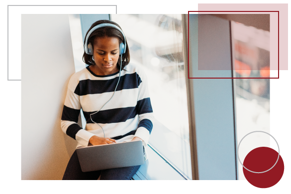 woman on laptop with headphones using ConnectWise Control